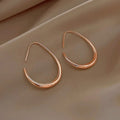 Waterdrop Shaped Big Hoop Earrings for Women Minimalist Metal Earrings Daily Wear Temperament Statement Jewelry.