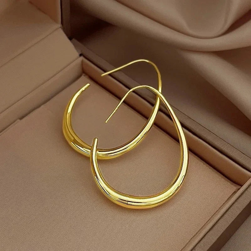 Waterdrop Shaped Big Hoop Earrings for Women Minimalist Metal Earrings Daily Wear Temperament Statement Jewelry.
